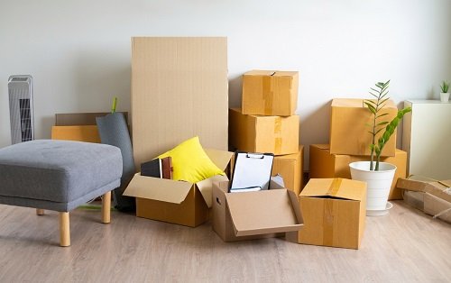 House moving boxes and furniture ready for unpacking
